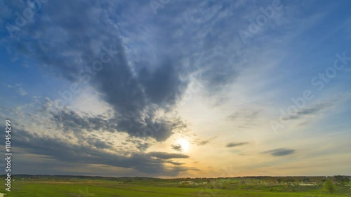 4 in 1! The flow of rain cloud over the city on the background of sunset