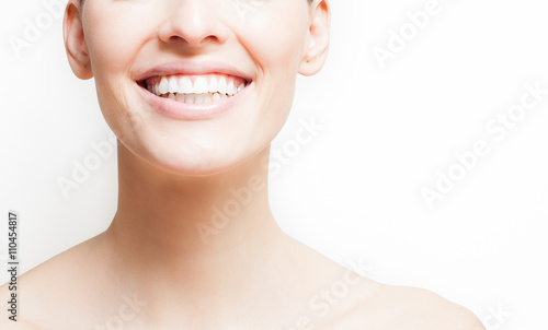 Woman smiling, white background, copyspace. 