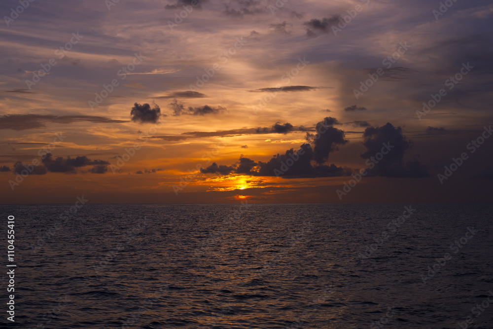 sunset over ocean nature composition