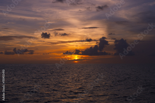 sunset over ocean nature composition