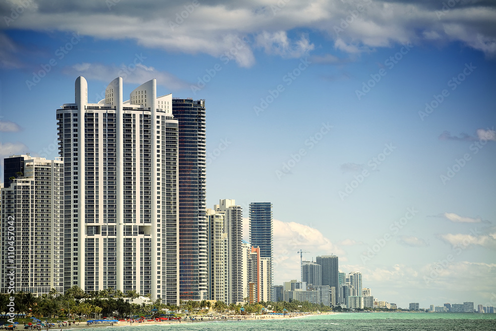 Fototapeta premium Beautiful beach with skyscrapers in Sunny Islands, Miami