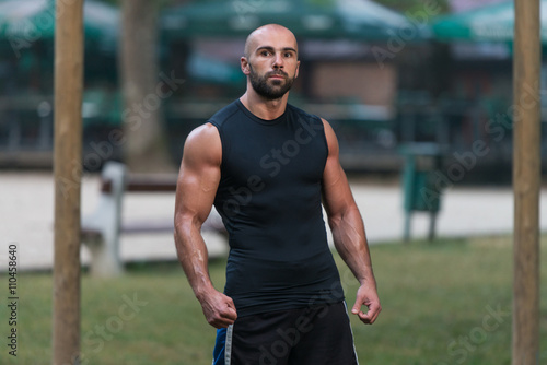 Portrait Of A Bodybuilder Posing Outdoors