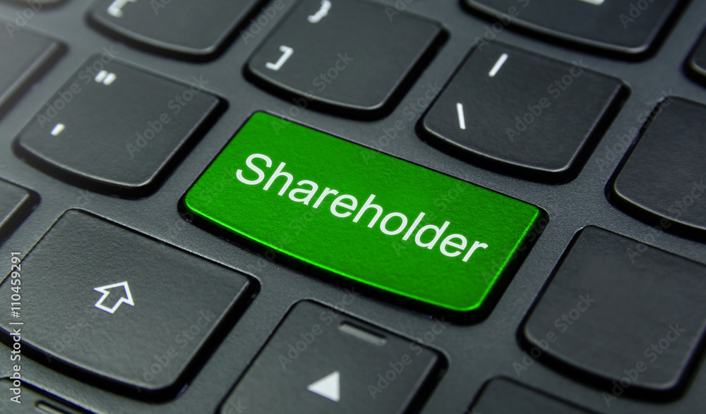 Business Concept: Close-up the Shareholder button on the keyboard and have Lime, Green color button isolate black keyboard