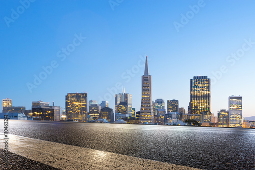 empty asphalt road with cityscape and skyline of san francisco