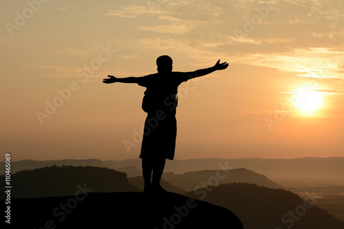 Man show hands silhouette sunset background.