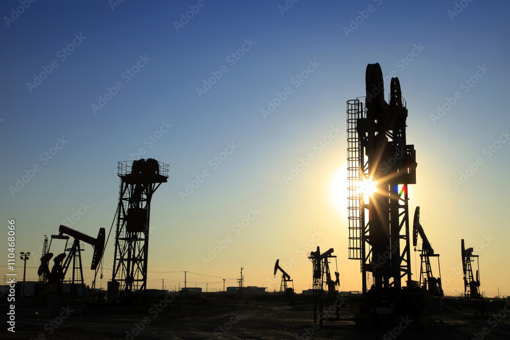 The silhouette of oilfield derrick The silhouette of oilfield derrick