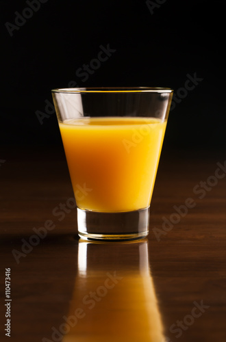A glass of chilled orange juice