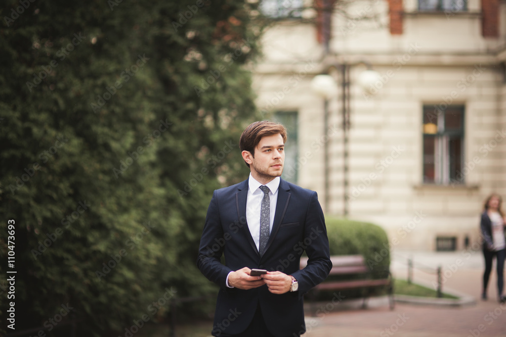 mobile smart phone in the hands of a businessman mobile smart phone in the hands of a businessman