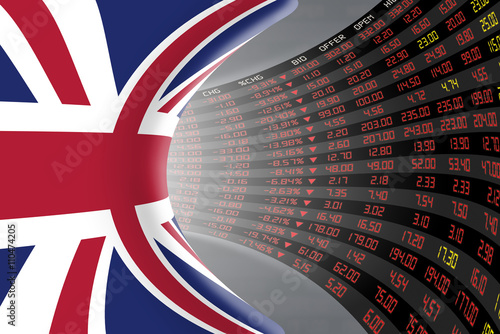 Flag of the United Kingdom with a large display of daily stock market price and quotations during economic recession period. The fate and mystery of the UK stock market, tunnel/corridor concept. photo