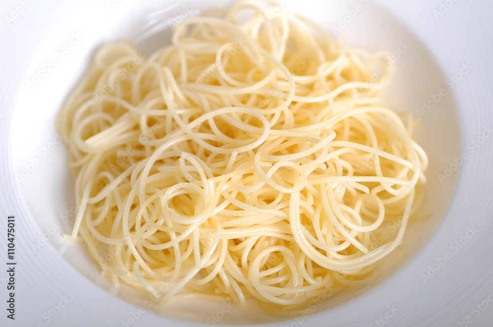 boiled spaghetti already in white bowl boiled spaghetti already in white bowl