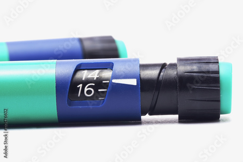 Insulin pen on a white background