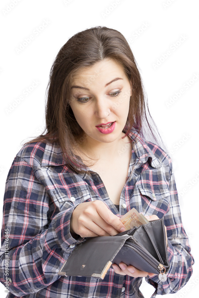 Pretty lady looking pleased with money in purse Pretty lady looking pleased with money in purse