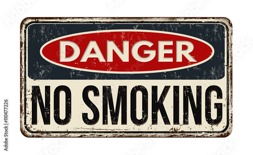 Danger no smoking rusty metal sign