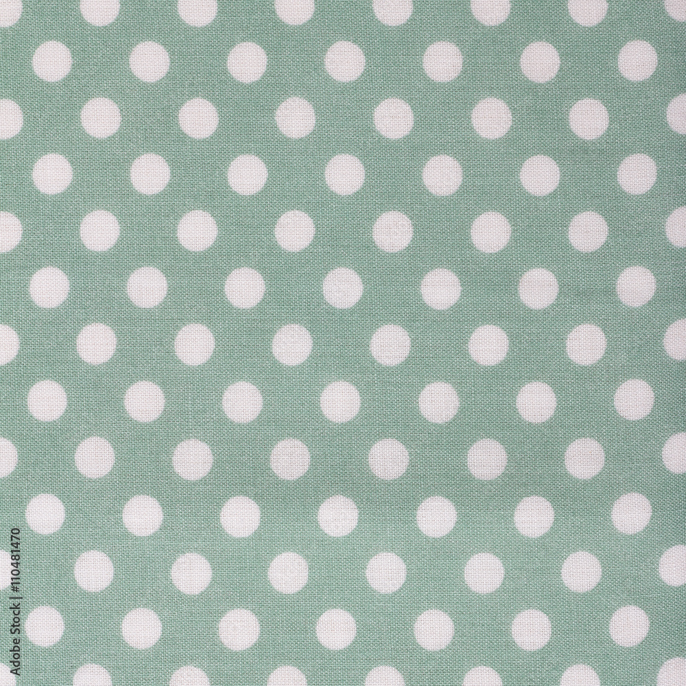 Green polka dot fabric, textile background, texture