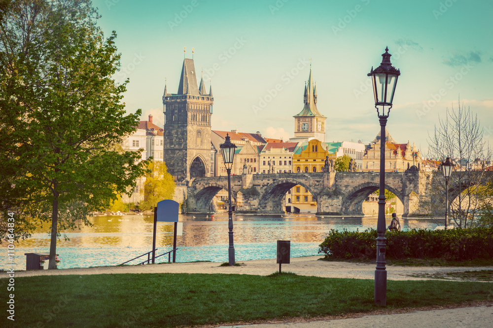 Prague, Czech Republic skyline with historic Charles Bridge and Vltava river. Vintage