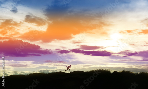  little boy jumping and having happy time  Sillhouette concept