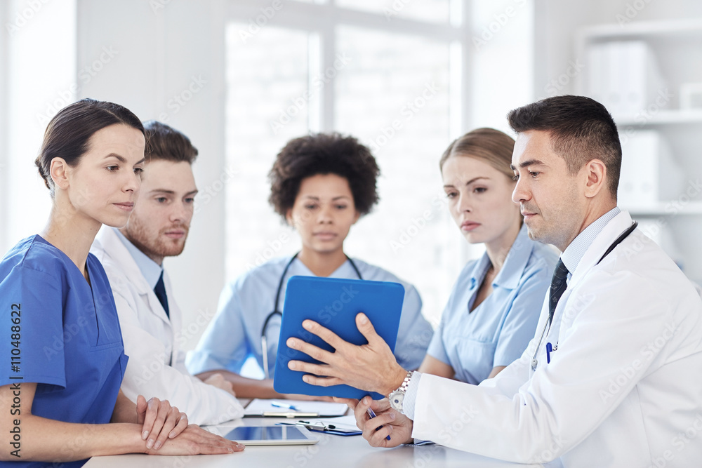 group of happy doctors meeting at hospital office group of happy doctors meeting at hospital office