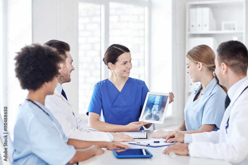 group of happy doctors meeting at hospital office group of happy doctors meeting at hospital office