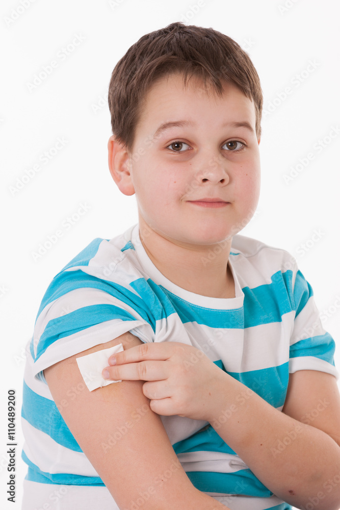 Doctor giving a child injection in arm on isolated image. Doctor giving a child injection in arm on isolated image.