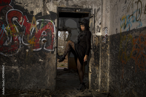 Gothic girl in old abandon kindergarden