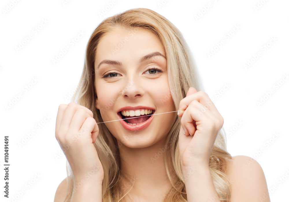 happy young woman with dental floss cleaning teeth happy young woman with dental floss cleaning teeth