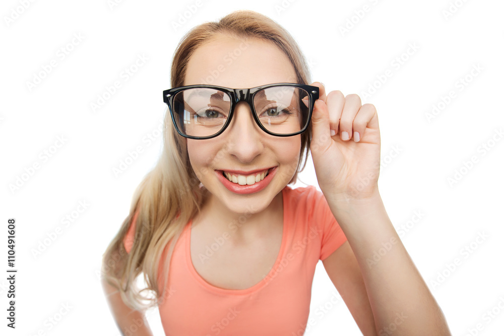 happy young woman or teenage girl in eyeglasses