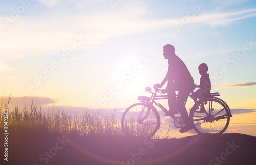 Biker family silhouette father and son