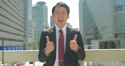 Japanese new worker excited about joining the workforce in city 