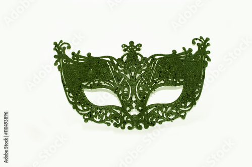 Beautiful green face mask on white studio background (wallpaper) 