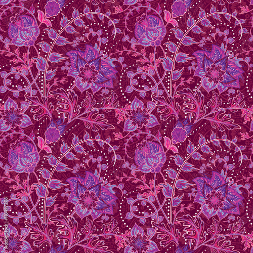 Fantasy flowers seamless paisley pattern. Floral ornament  on dark pink background for fabric, textile, cards, wrapping paper, wallpaper template.Ornamental bright motif