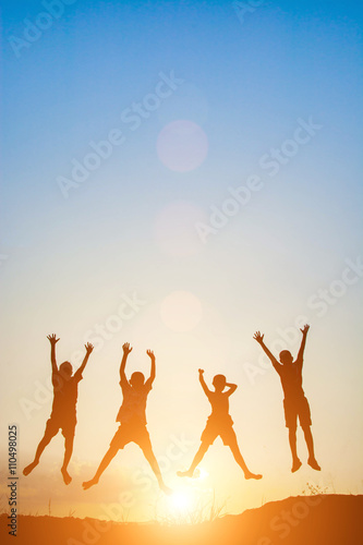 Silhouette of children jump gladness happy time