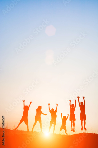 Silhouette of children jump gladness happy time