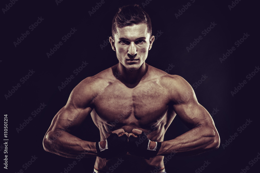 MMA Fighter Preparing Bandages For Training MMA Fighter Preparing Bandages For Training