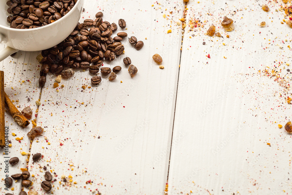 Coffee Beans, Cinnamon and Brown on Light White Wooden Table, free Space for Text Coffee Beans, Cinnamon and Brown on Light White Wooden Table, free Space for Text