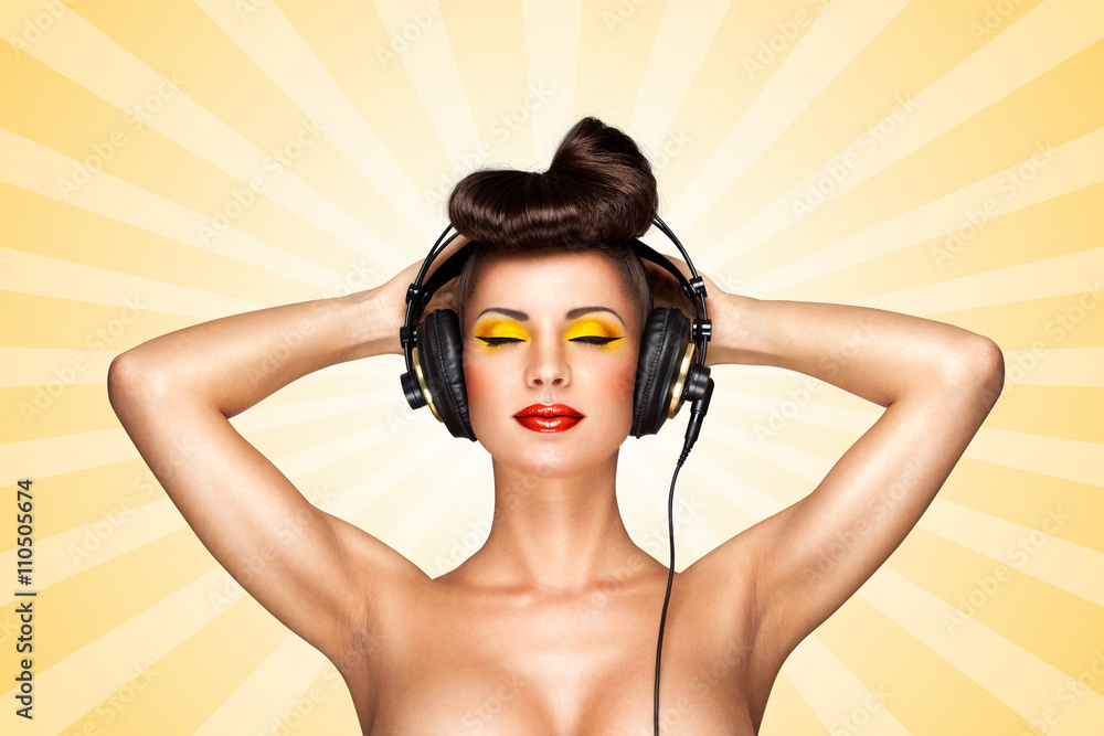 1000px x 667px - Nude pin-up party / Retro photo of a nude pin-up girl with big vintage  music headphones on colorful abstract cartoon style background. Stock Photo  | Adobe Stock