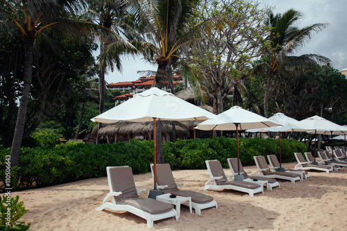 chairs and white umbrella on the beach. Banner.Summer.Travel Vac