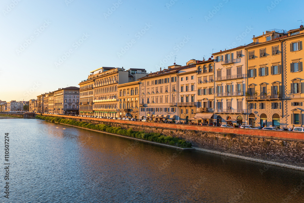 Houses along the river Arno in Florence by evening light