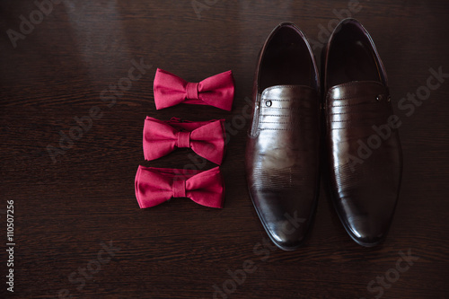 Gentleman accessory red bow tie and shoes