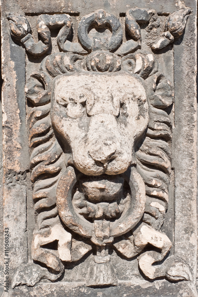 Lion head stone carving