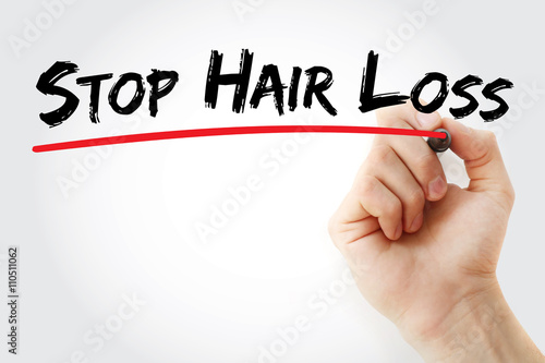 Hand writing Stop Hair Loss with marker, health concept background