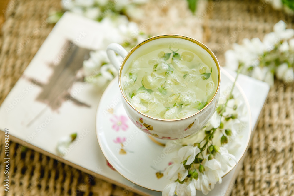 Acacia tea brewed in a cup is on the table Acacia tea brewed in a cup is on the table