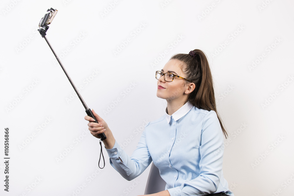 Young girl make selfie picture by mobile phone. Young girl make selfie picture by mobile phone.