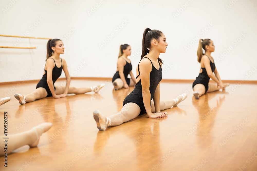 Fototapeta premium Dancers warming up and stretching