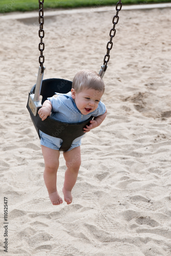Baby Boy in Swing at Park