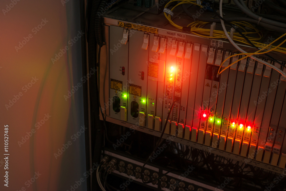 Obraz premium fiber optic with servers in a technology data center