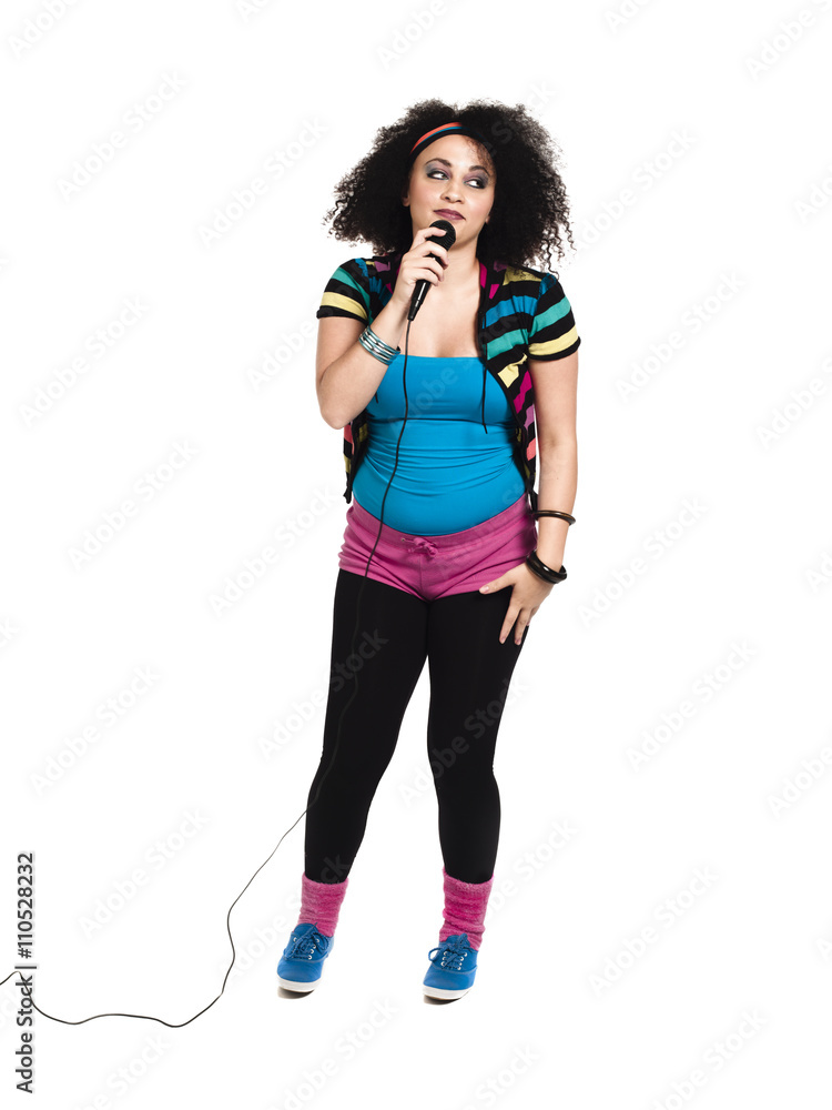 female singer with microphone looking away. female singer with microphone looking away.