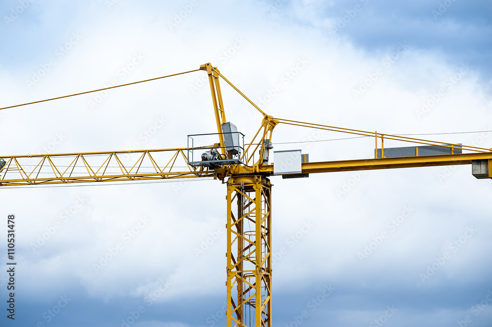 Construction crane with cloudy sky Construction crane with cloudy sky