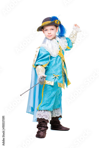 Little boy posing in musketeer costume