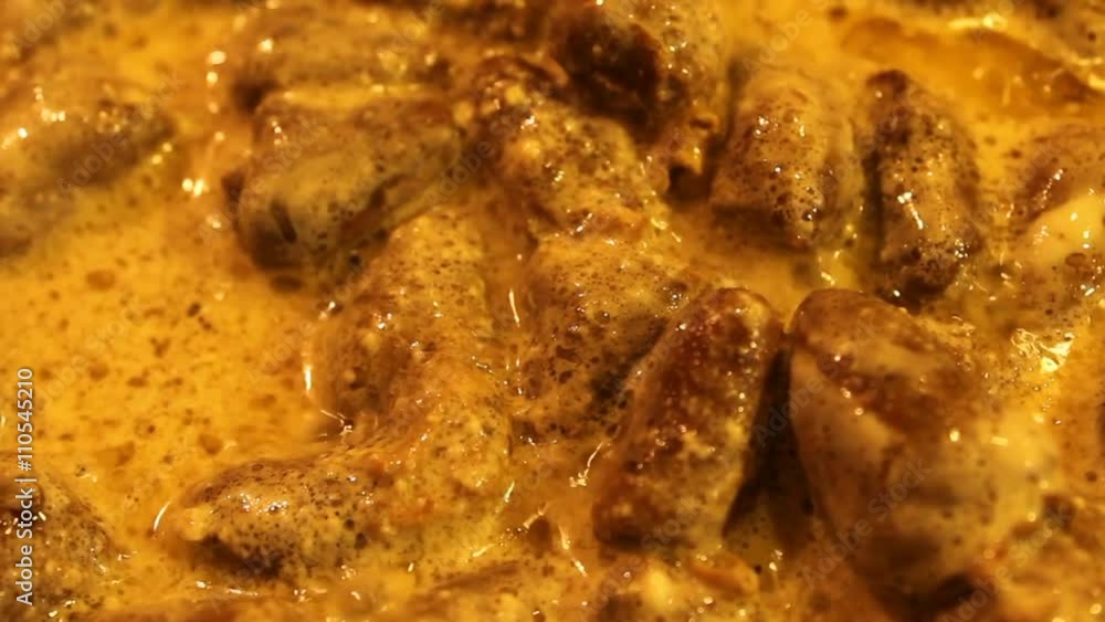 Hearts fried in sour cream. Chicken hearts braised in cream. Cook chicken hearts. Chicken Hearts at white background. Lightly fried chicken hearts. Chicken hearts on the pan. Raw chicken hearts. Hearts fried in sour cream. Chicken hearts braised in cream. Cook chicken hearts. Chicken Hearts at white background. Lightly fried chicken hearts. Chicken hearts on the pan. Raw chicken hearts.