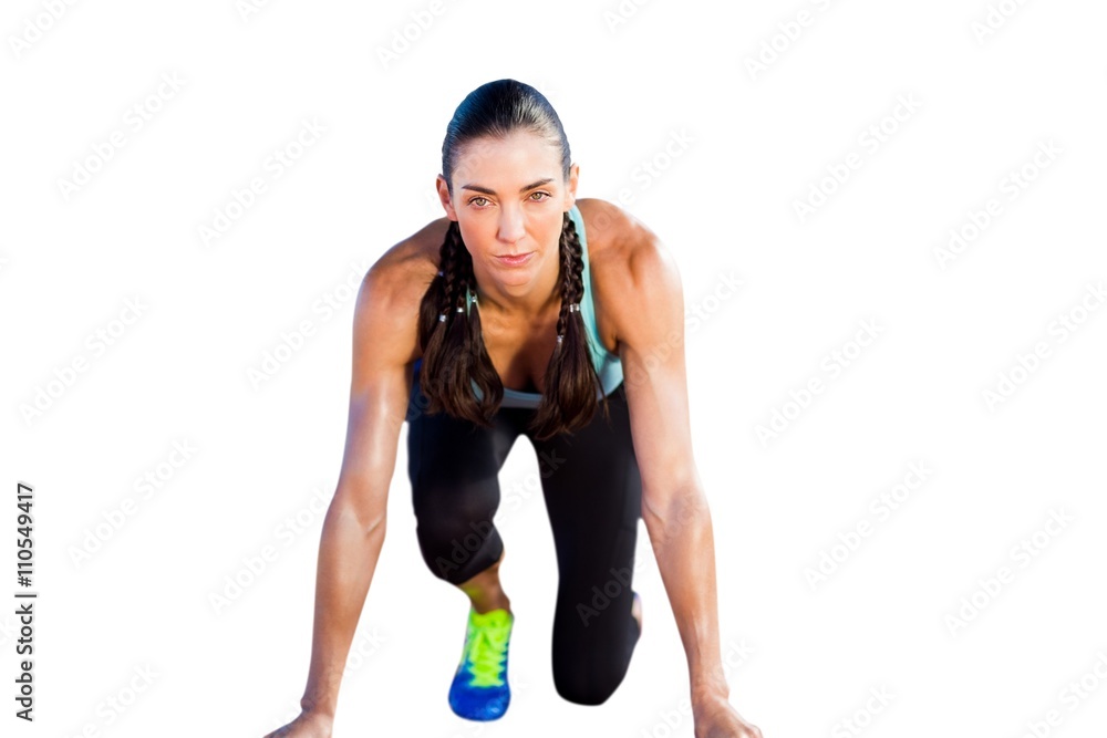 Sporty woman in the starting block Sporty woman in the starting block